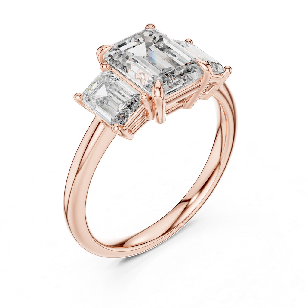 Emerald Cut Three-Stone Moissanite Engagement Ring with Tapered Step-Cut Side Stones - 3.00 CT Art Deco Bridal Design in Gold or Silver | The Elisora Jewels