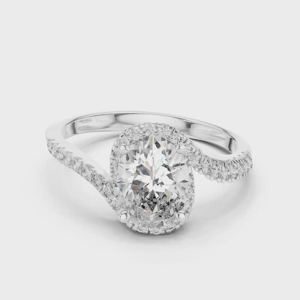 Elisora Oval Pavé Twist Moissanite Engagement Ring | Twisted Pavé Band Oval Solitaire in 10K/14K Gold or Silver
