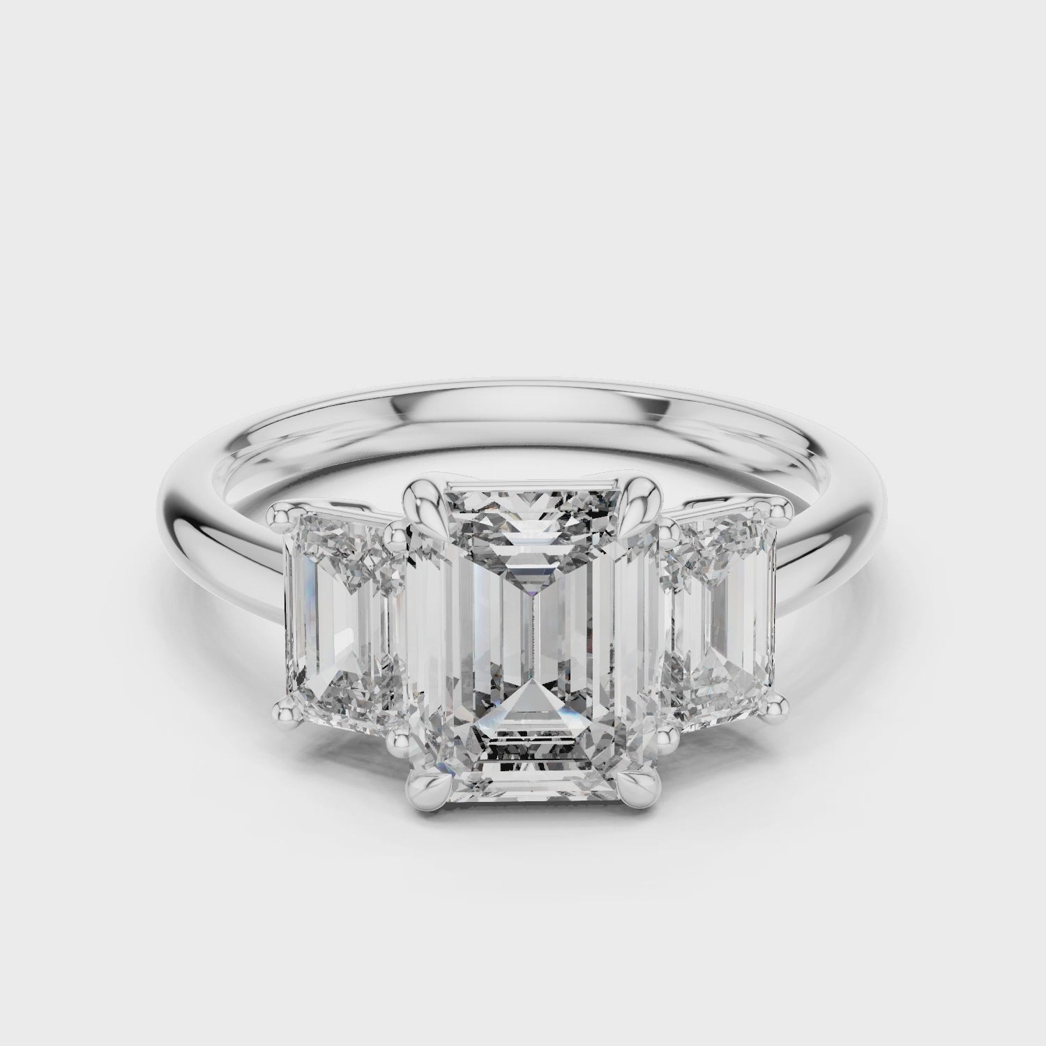 Emerald Cut Three-Stone Moissanite Engagement Ring with Tapered Step-Cut Side Stones - 3.00 CT Art Deco Bridal Design in Gold or Silver | The Elisora Jewels