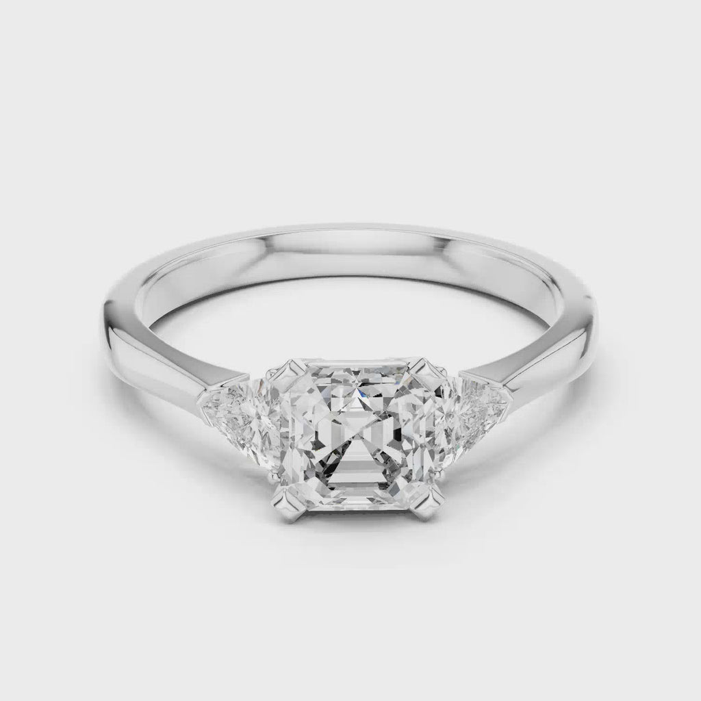 Elisora Emerald Cut Three-Stone Engagement Ring | Trillion Side Stones | Moissanite or Lab Diamond in 10K/14K Gold or Silver